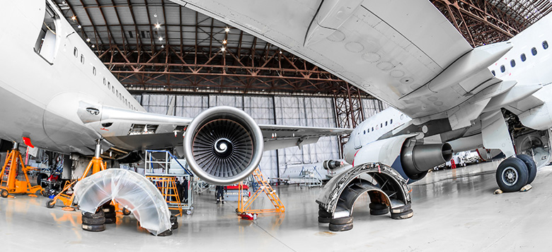 Performing maintenance and repair on airplanes in a hangar