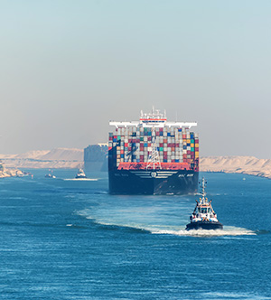 A container ship moving through the Suez Canal